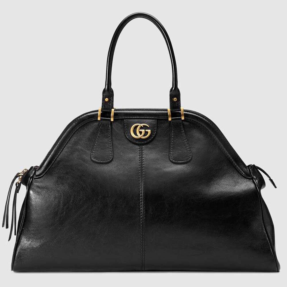 black gucci luggage