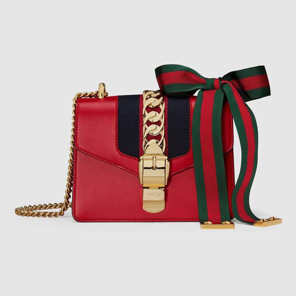 White Handbag Gucci with a Bird