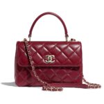 Bolso pequeño con solapa y asa superior de Chanel para mujer en piel de cordero color granate