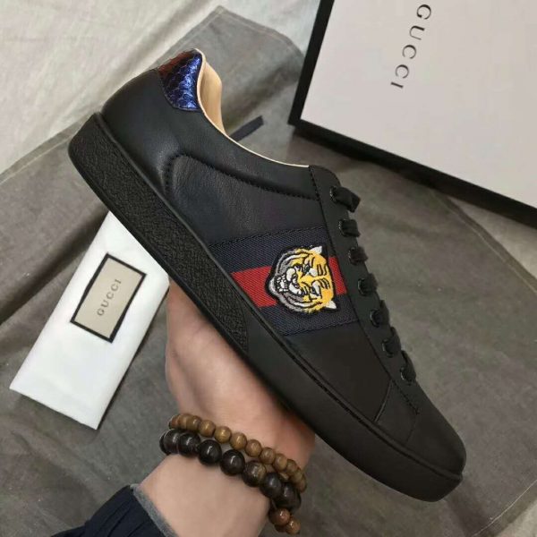 black gucci shoes with tiger