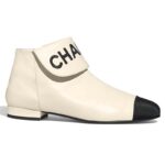 Bottes courtes Chanel Loge pour femme en cuir de chèvre et faille - Blanc