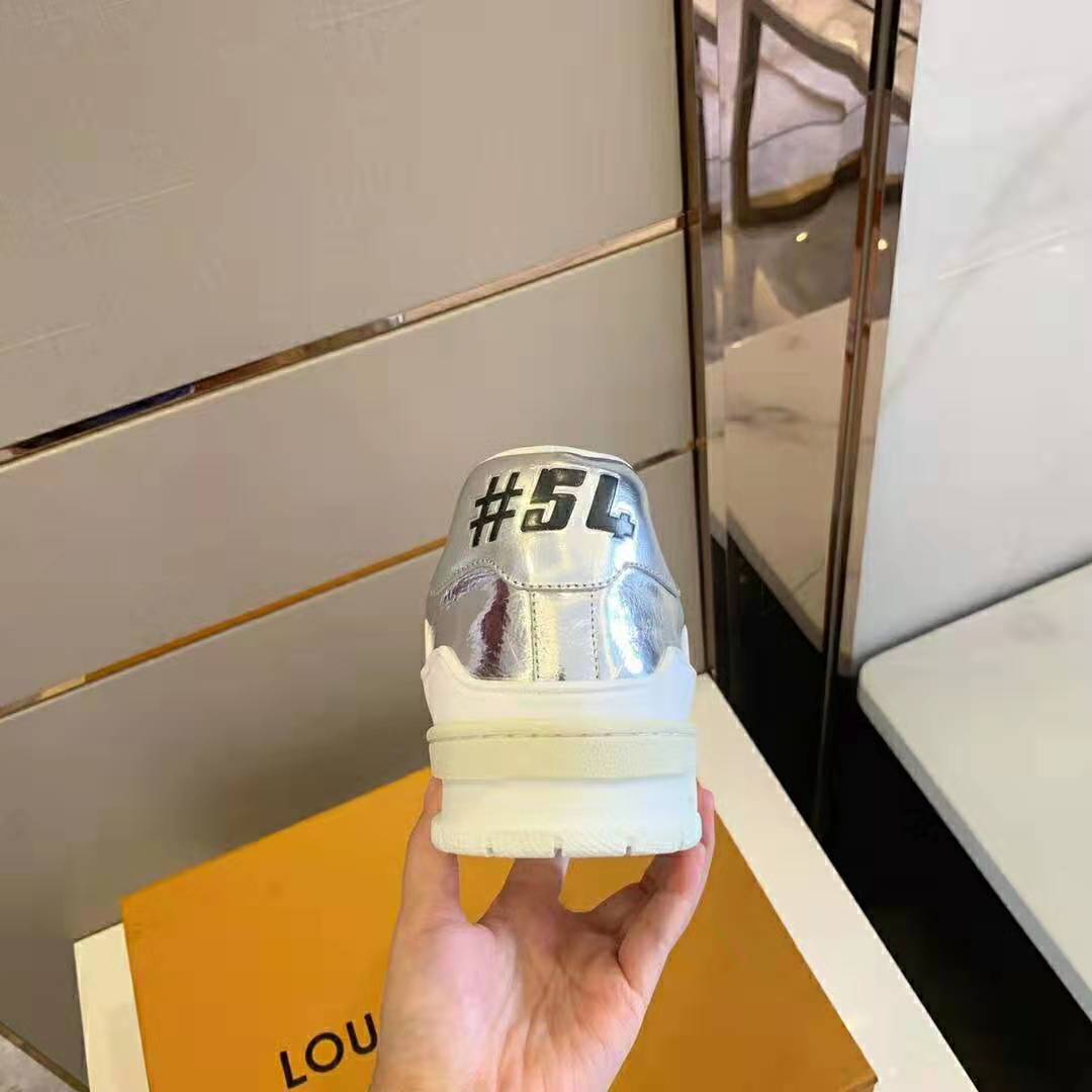 Louis Vuitton LV Men LV Trainer Sneaker in Metallic Silver Leather with Louis  Vuitton Script Signature - LULUX