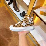 Louis Vuitton LV Unisex Stellar Sneaker Boot in Pony-Styled Calf Leather with Giant LV Monogram Flowers-Brown - Imagen 9