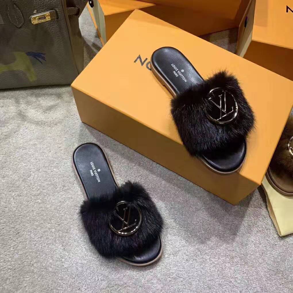Lock it faux fur mules Louis Vuitton Black size 36 EU in Faux fur