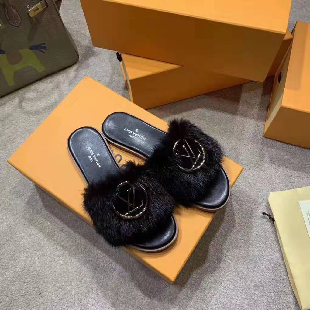 Lock it faux fur mules Louis Vuitton Black size 36 EU in Faux fur - 23682683