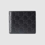Cartera plegable Gucci GG para hombre con la firma Gucci en piel negra