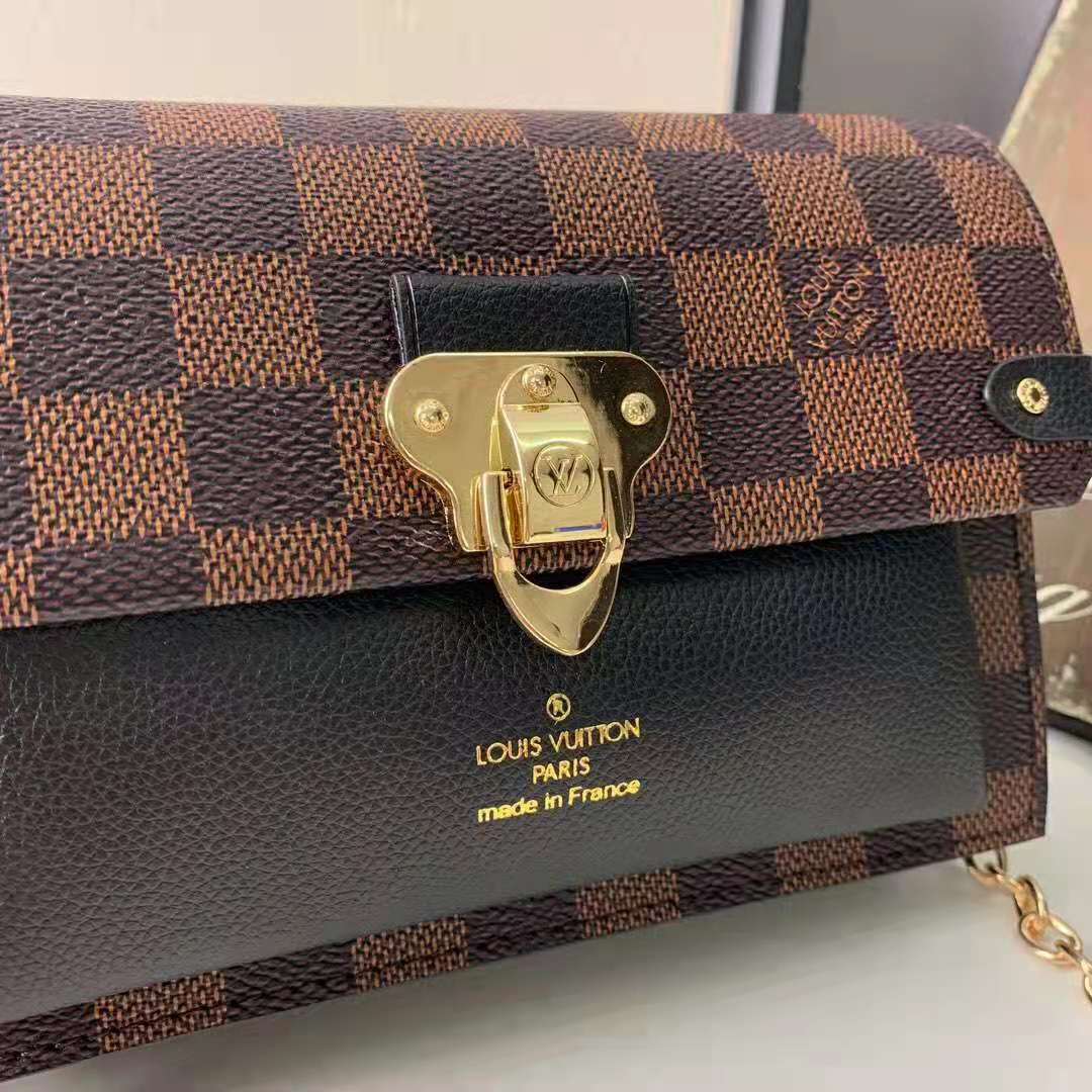 Louis Vuitton Damier Ebene Vavin Wallet on Chain in brown coated/waterproof  canvas Cloth ref.368571 - Joli Closet