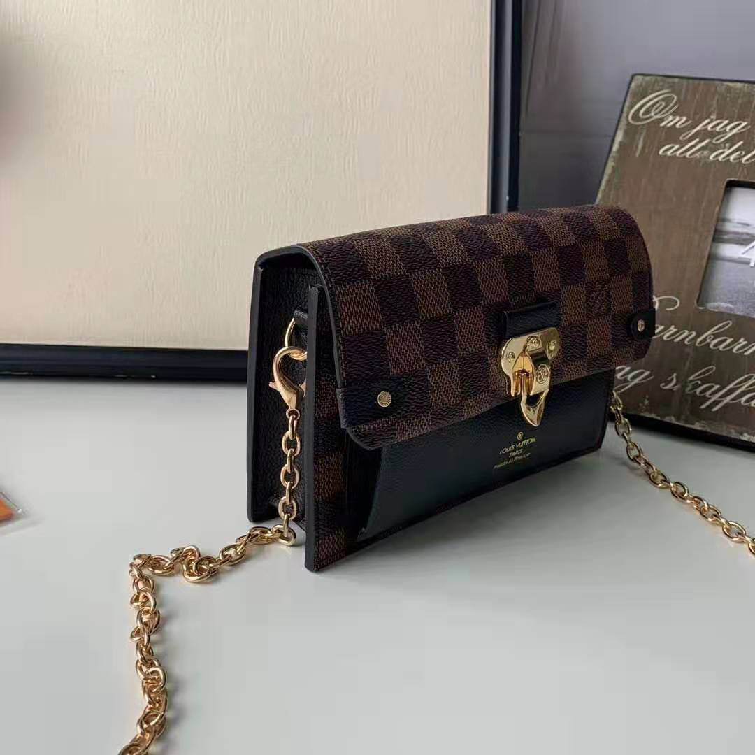 Louis Vuitton Damier Ebene Canvas & Black Cowhide Vavin Chain Wallet Brown  ref.659131 - Joli Closet