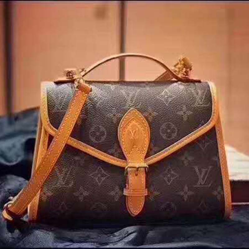 Ivy handbag Louis Vuitton Brown in Cotton - 26900653