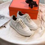 Hermes Women Turn Sneaker in Calfskin Saddle Stitch Detail-White - Image 2