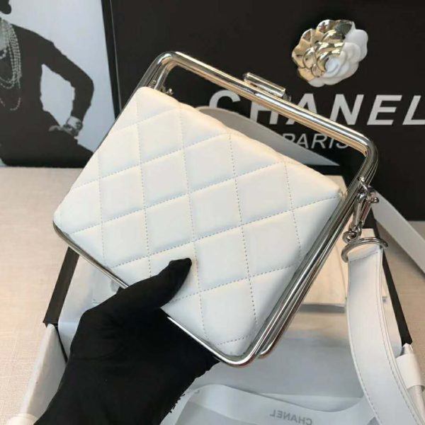 white and silver clutch
