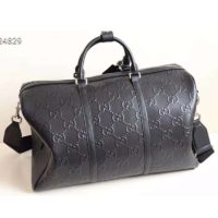 Gucci GG Unisex GG Embossed Duffle Bag Black Embossed Leather