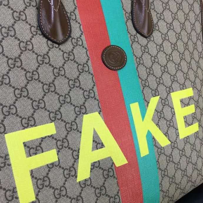 Gucci Unisex ‘Fake/Not’ Print Large Tote Bag GG Supreme Canvas