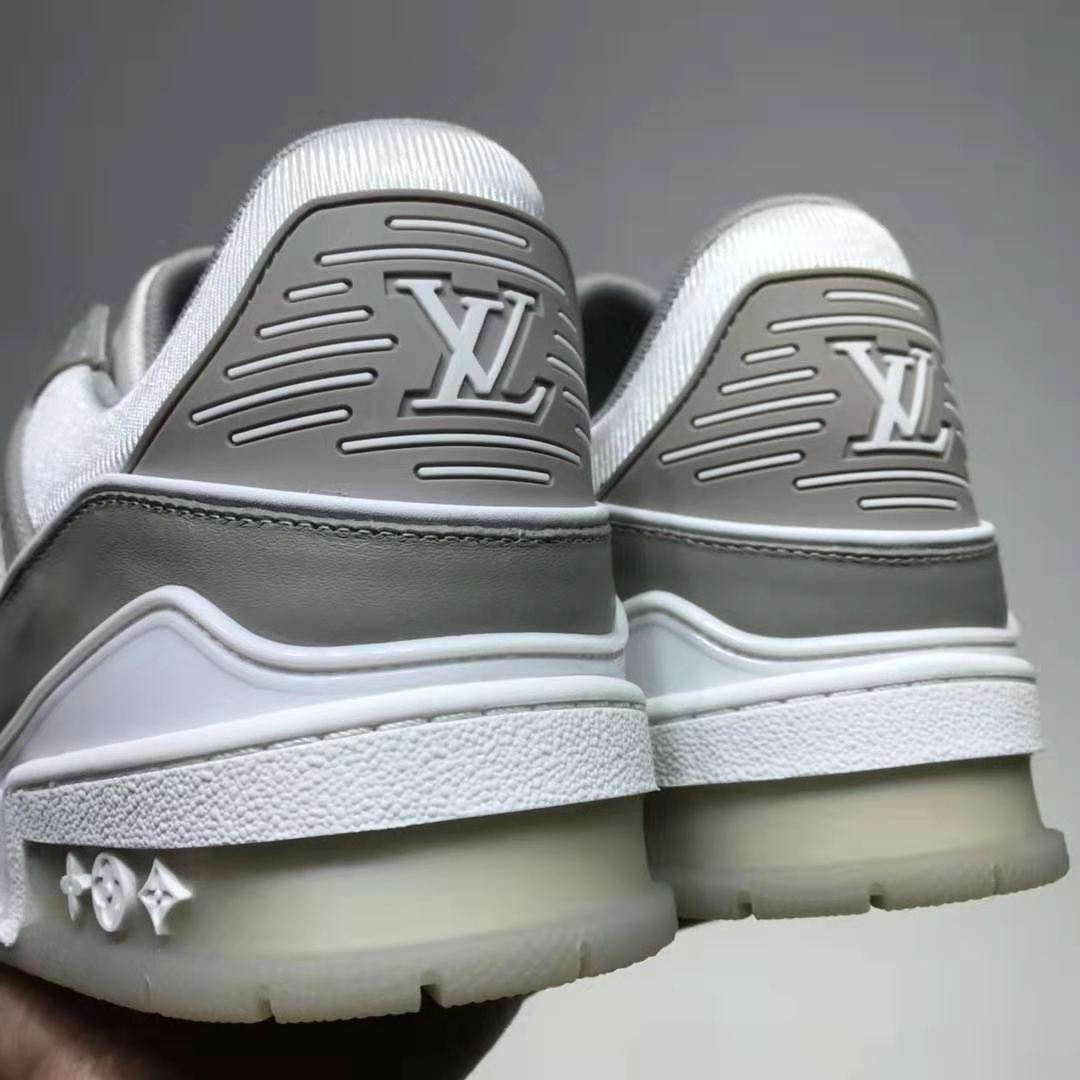 Louis Vuitton LV Men LV Trainer Sneaker in Metallic Silver Leather with Louis  Vuitton Script Signature - LULUX