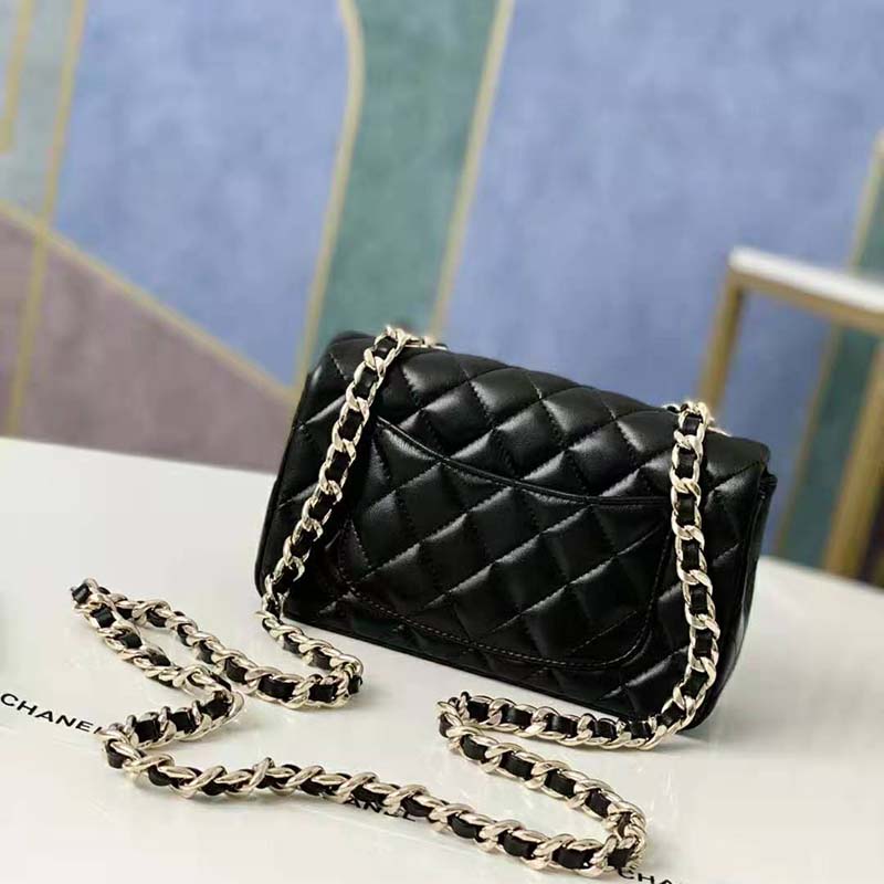 Mini flap bag, Lambskin & gold-tone metal, black — Fashion, CHANEL