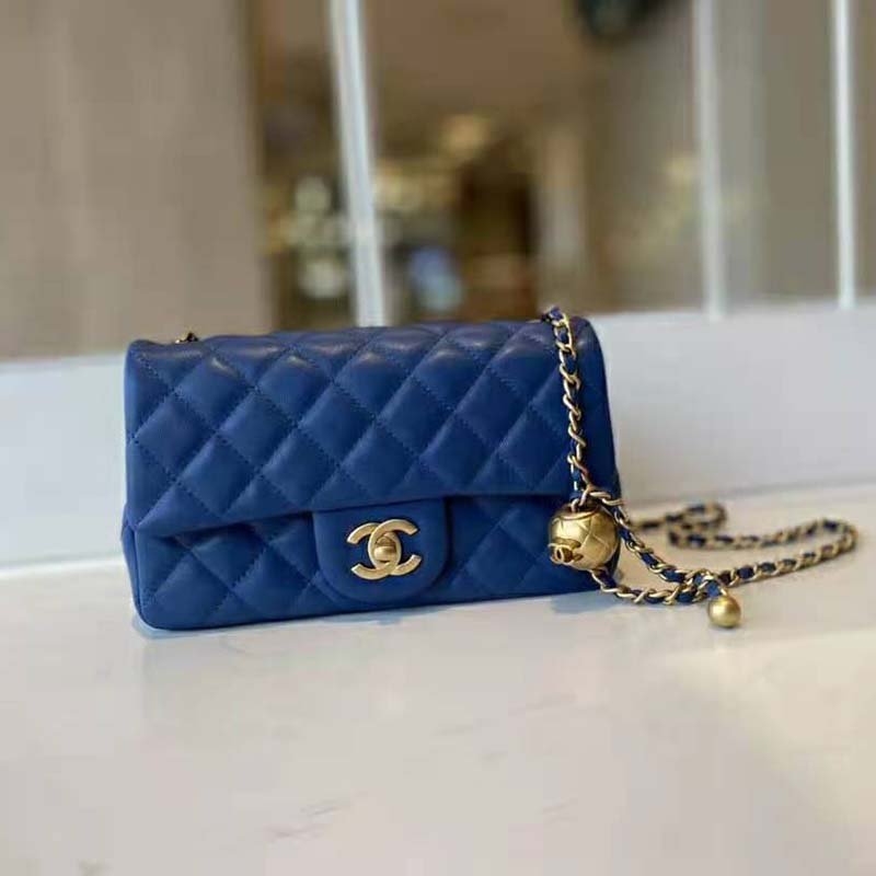 Chanel Flap Bag with Top Handle Mini Baby Blue in Lambskin Leather with  Gold-tone - US