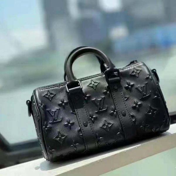 Louis Vuitton Men City in Black Monogram Seal Leather -