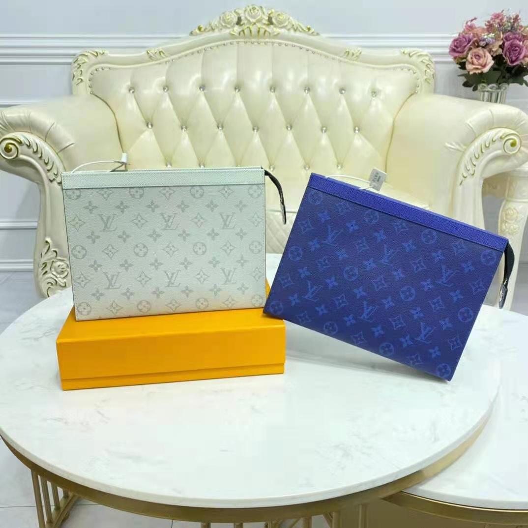 Louis Vuitton Monogram Taigarama Pochette Voyage MM (SHG-XGxVo6