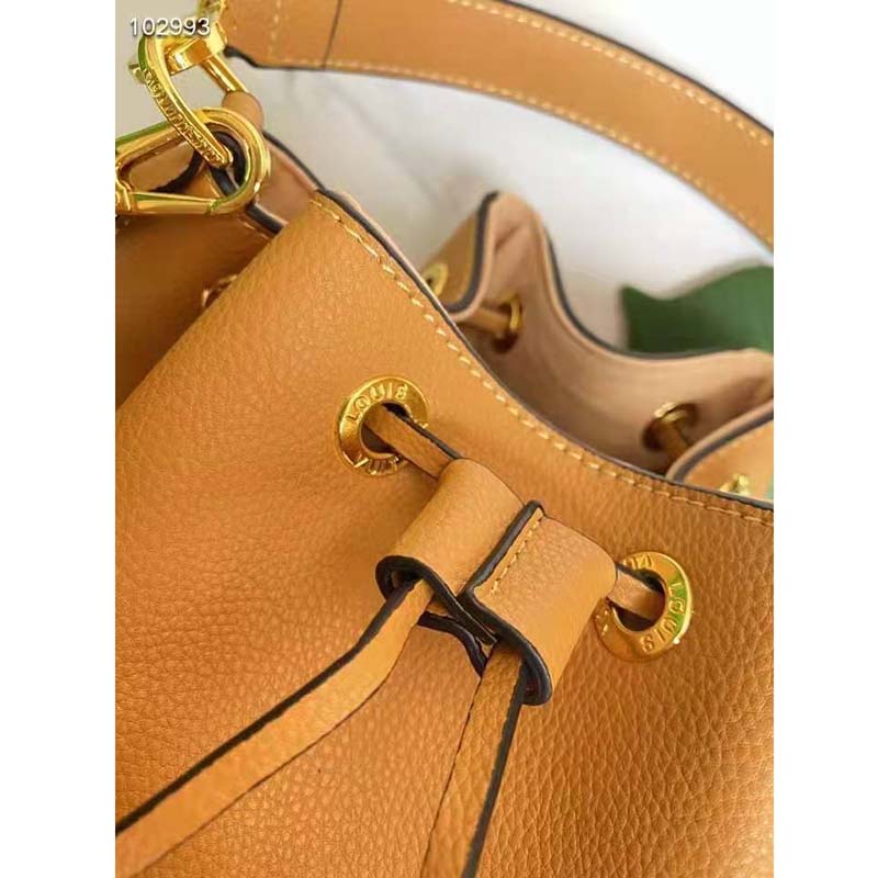 Authentic Louis Vuitton Beige Grained Calf Leather Lockme Bucket Bag