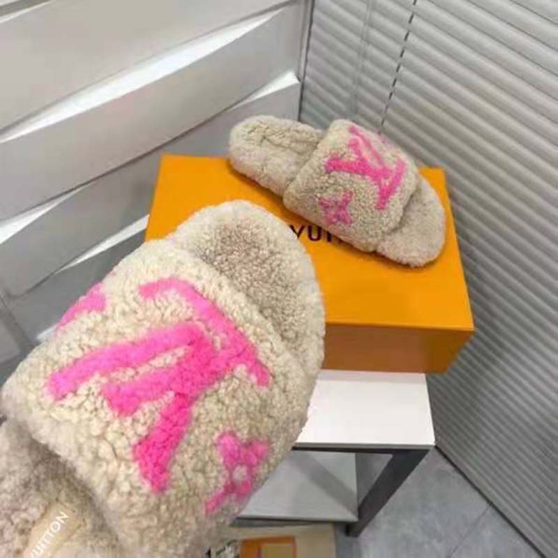 LOUIS VUITTON, Paseo flat comfort mule, beige sheepskin/shearling, decor  with classic LV logo and flowers in neon pink. Vintage clothing &  Accessories - Auctionet