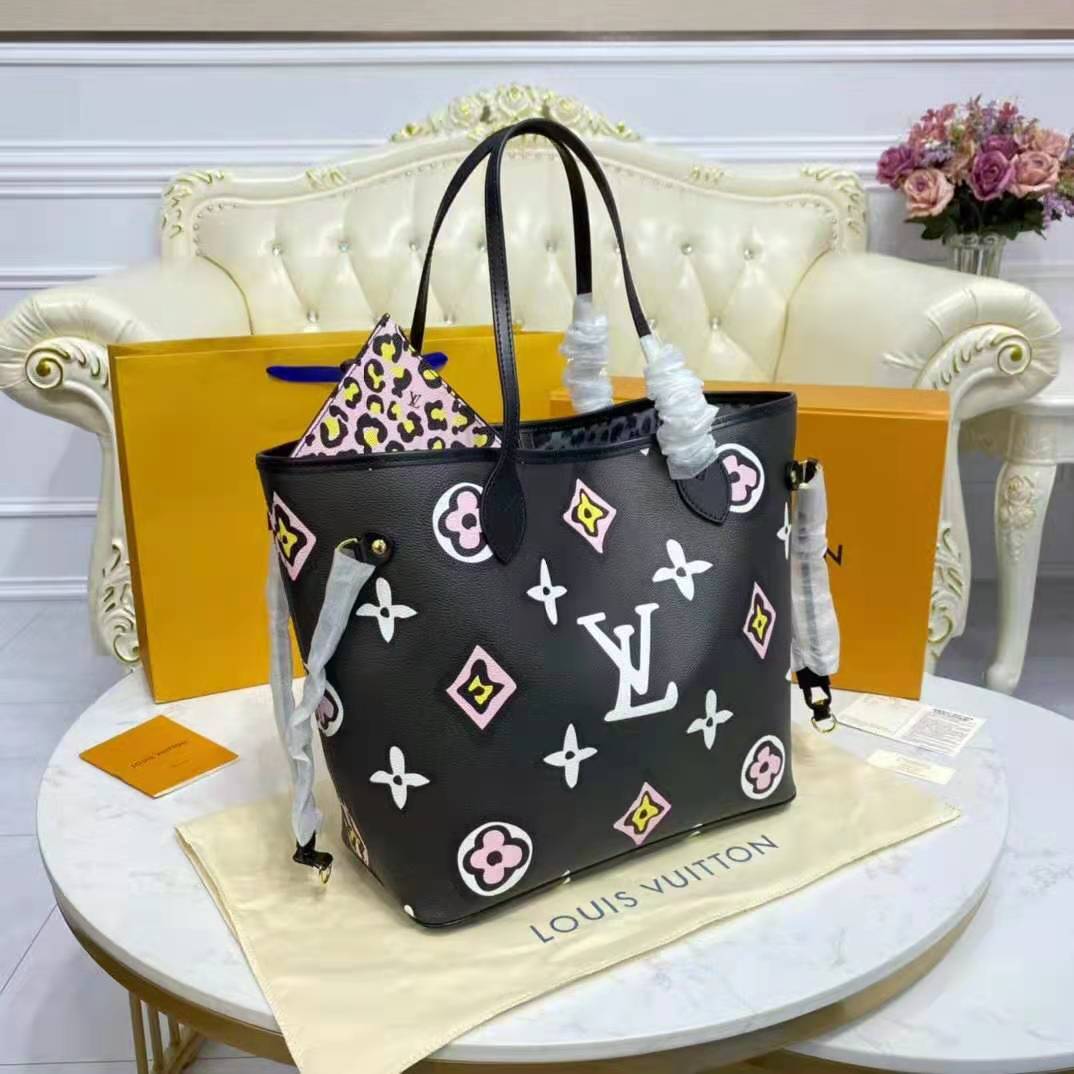 Louis Vuitton “Neverfull MM” Tote coated fabric cowhide leather trim.