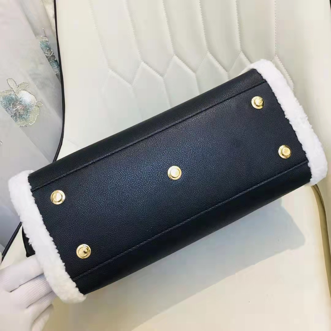 Louis Vuitton Black Grained Calfskin & White Shearling Monogram on My Side mm - Handbag | Pre-owned & Certified | used Second Hand | Unisex
