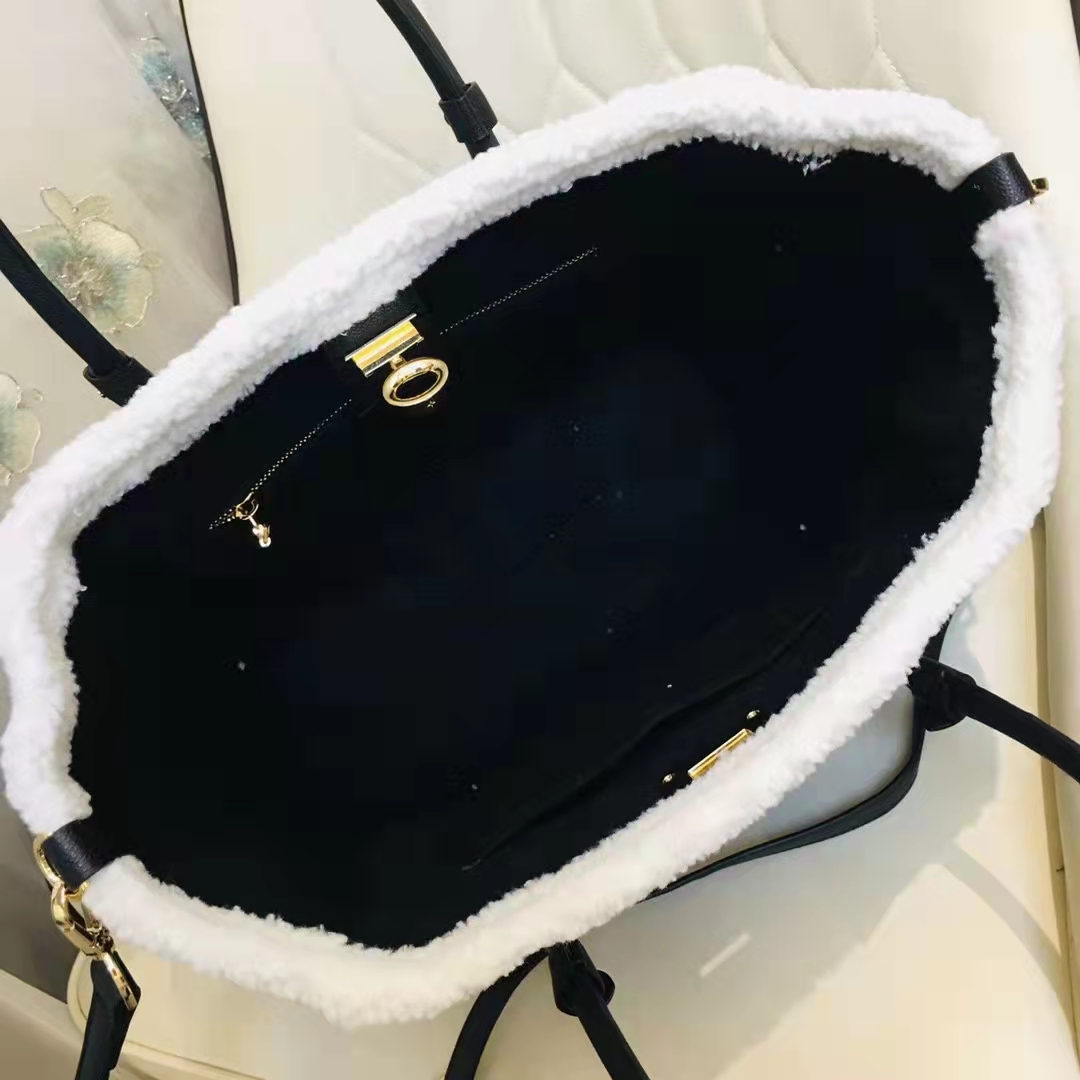 Louis Vuitton Black Grained Calfskin & White Shearling Monogram on My Side mm - Handbag | Pre-owned & Certified | used Second Hand | Unisex