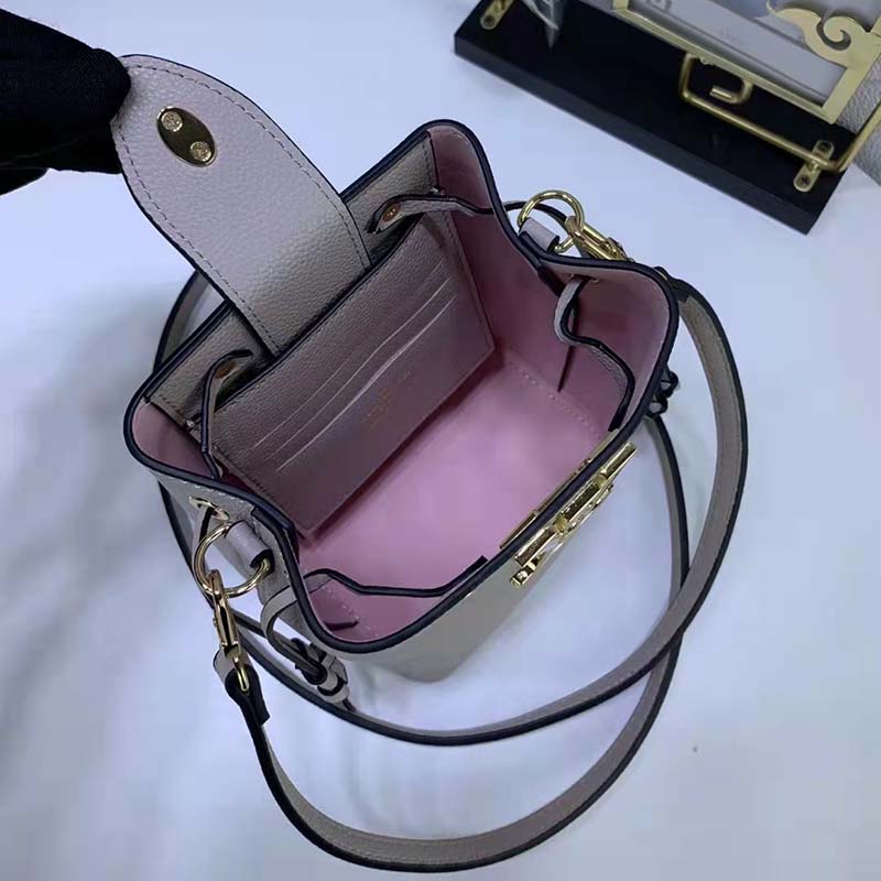 ✖️SOLD✖️ Louis Vuitton Greige Nano Lockme Bucket Bag $2,150.00 Microchipped  Material: Calfskin Hardware: Gold-tone Colour: Greige Size:…