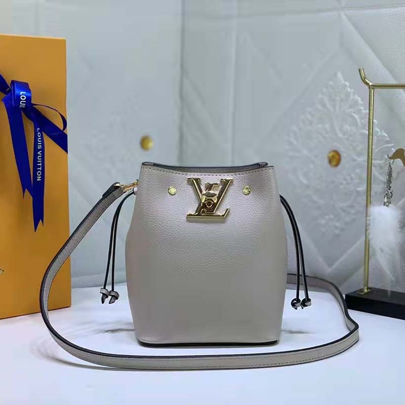 Louis Vuitton, Bags, Louis Vuitton Lockme Bucket Mm Greige Calfskin Bucket  Bag