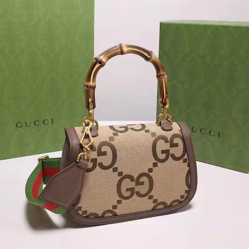 Gucci Bamboo 1947 jumbo GG small top handle bag in camel and ebony canvas