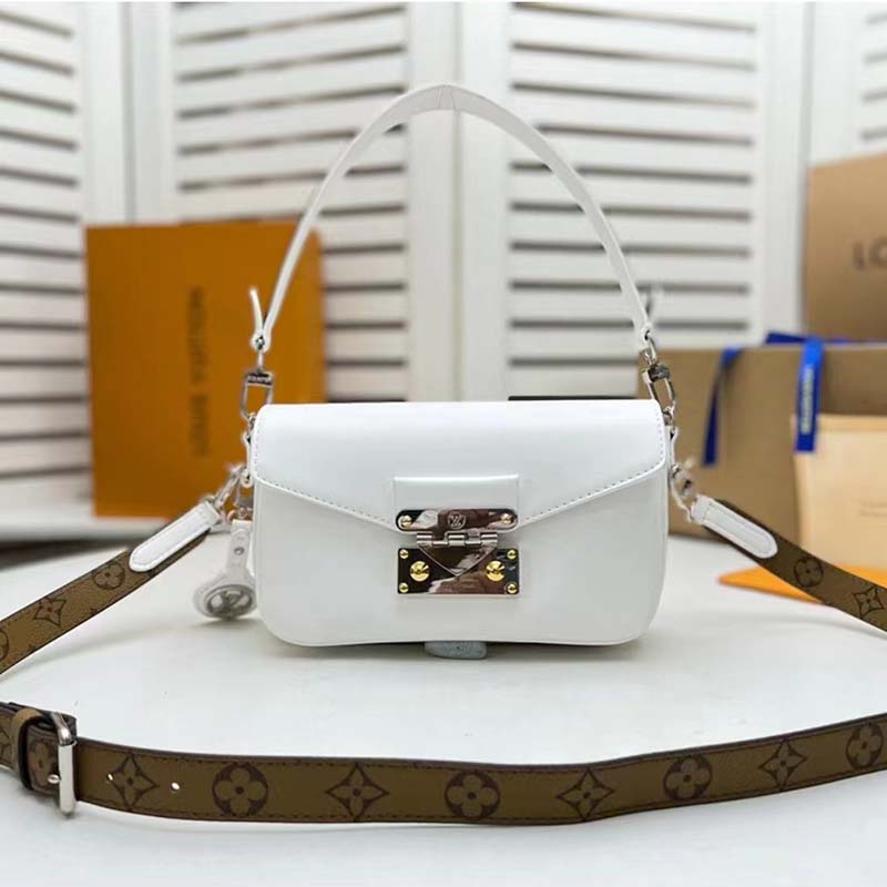 Louis Vuitton Swing Handbag Calfskin Leather Gold and Silver Color Fin –  EliteLaza