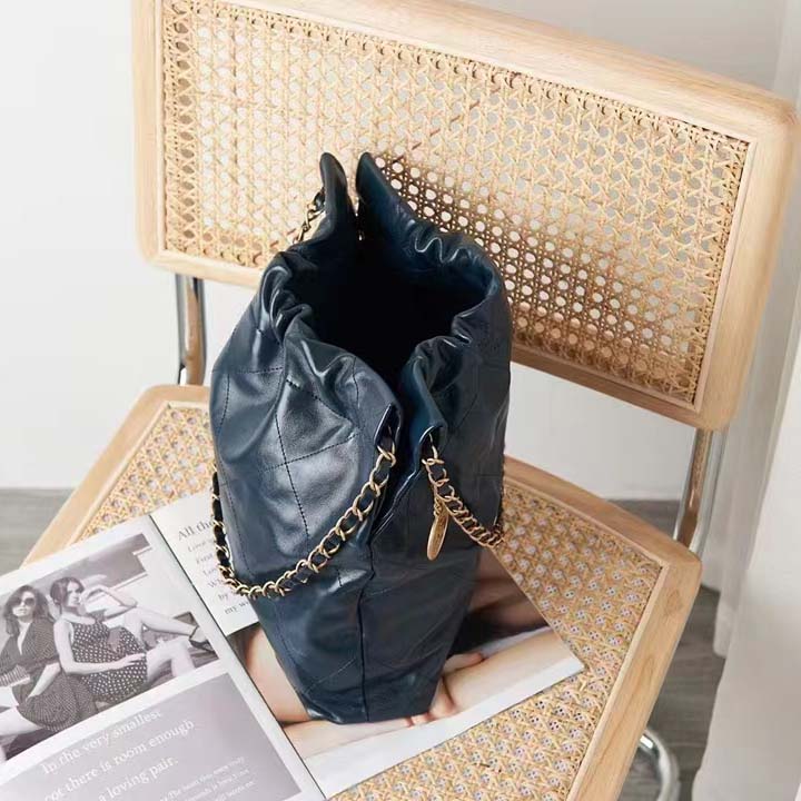 Chanel Women 22 Small Handbag Shiny Calfskin Gold-Tone Metal Navy