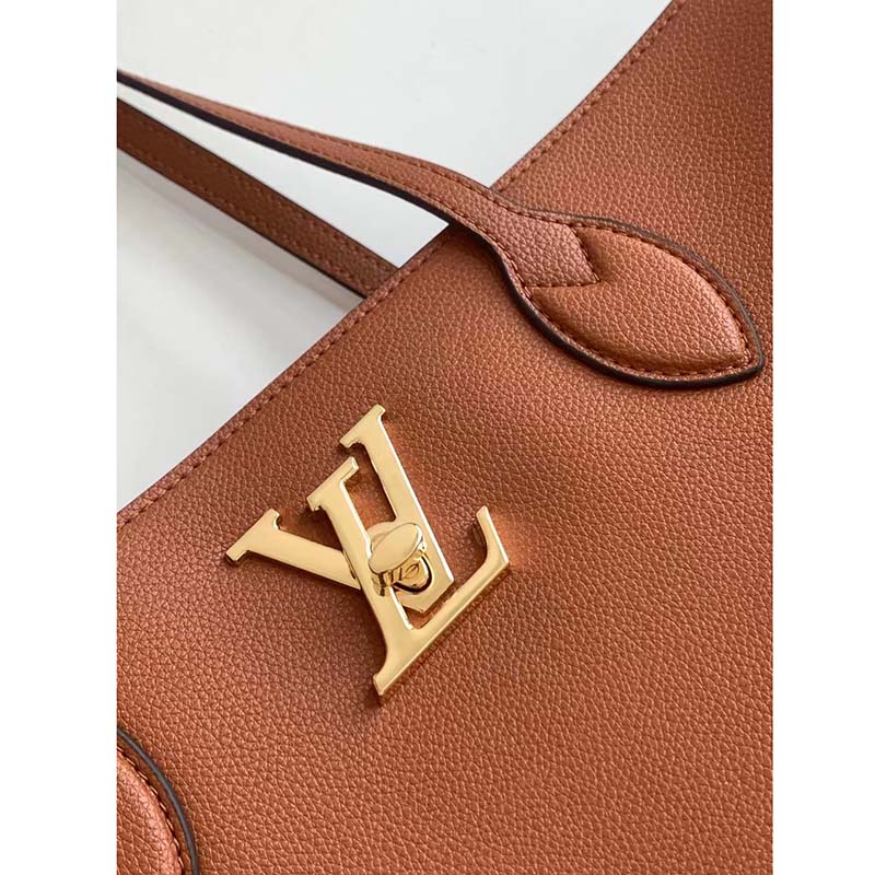 Louis Vuitton Grieige Grained Calf Leather Lockme Shopper Flesh Pony-style  calfskin ref.620278 - Joli Closet