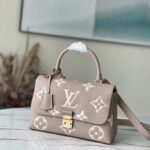 Louis Vuitton LV Women Madeleine MM Handbag Embossed Monogram Empreinte Cowhide - Image 2