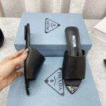 Prada Women Brushed Leather Slides with a Modernist Line Feature an Unexpected – Bild 8