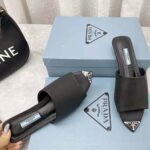 Prada Women Brushed Leather Slides with a Modernist Line Feature an Unexpected – Bild 10