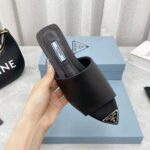 Prada Women Brushed Leather Slides with a Modernist Line Feature an Unexpected – Bild 9