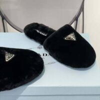 Prada Women Enameled Triangle Logo Accentuates Shearling Sabots (1)