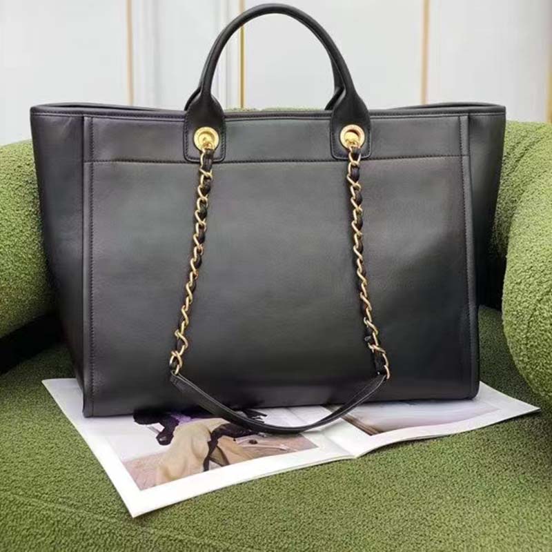 Small shopping bag, Calfskin & gold-tone metal, black — Fashion