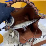 Louis Vuitton LV Women Muria Bucket Bag Crème Beige Mahina Perforated Calf Leather - Image 8