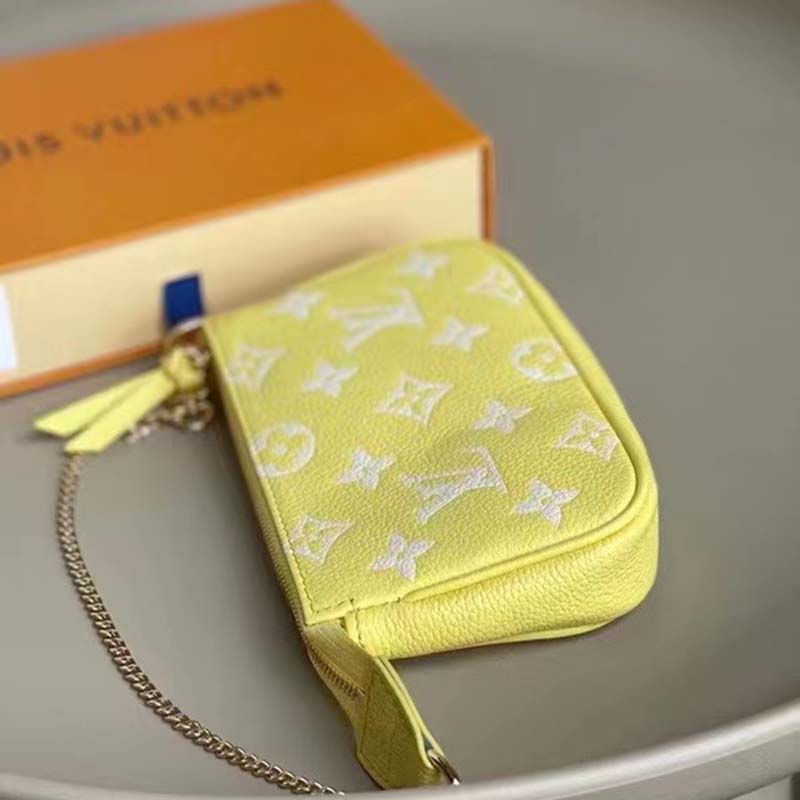 LOUIS VUITTON Empreinte Monogram Mini Pochette Accessories Lemon Curd  Yellow 1285512