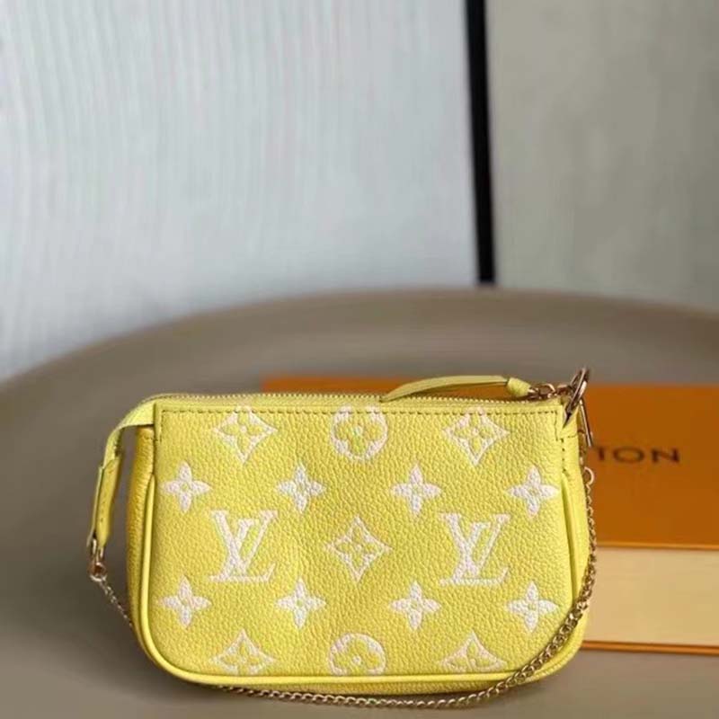 Louis Vuitton Pochette Accessories Mini Monogram Empreinte Embossed Lemon  Curd Yellow in Cowhide Leather with Gold-tone - US