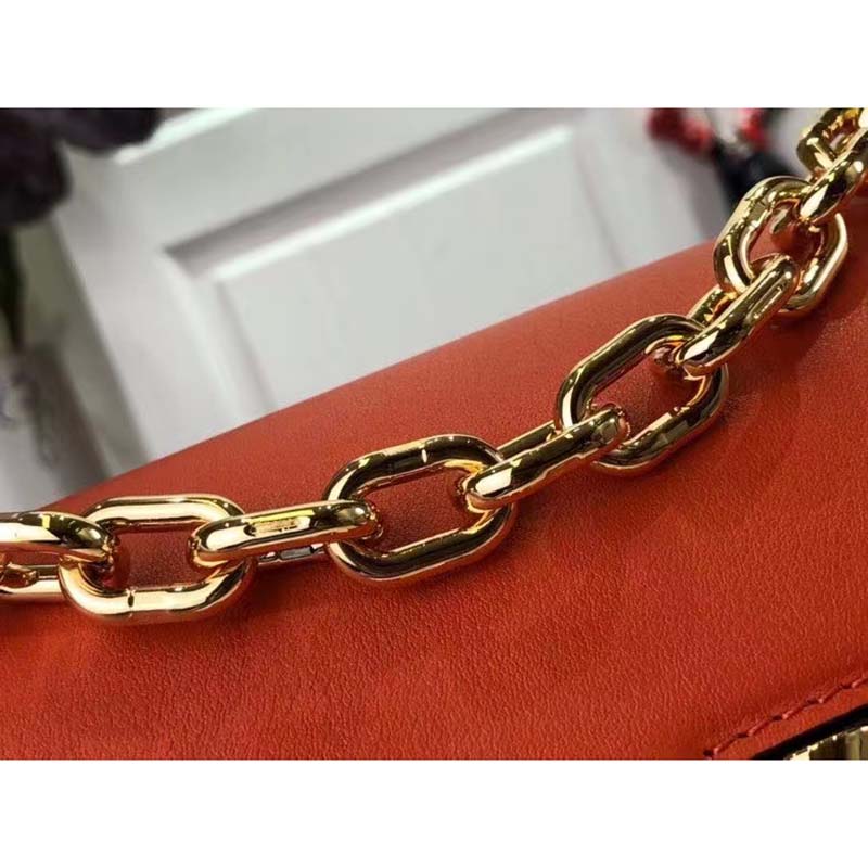 Twist belt wallet on chain leather crossbody bag Louis Vuitton Orange in  Leather - 28053794