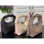 Louis Vuitton LV Unisex Why Knot MM Handbag Galet Beige Perforated Mahina Calf Leather - immagine 12