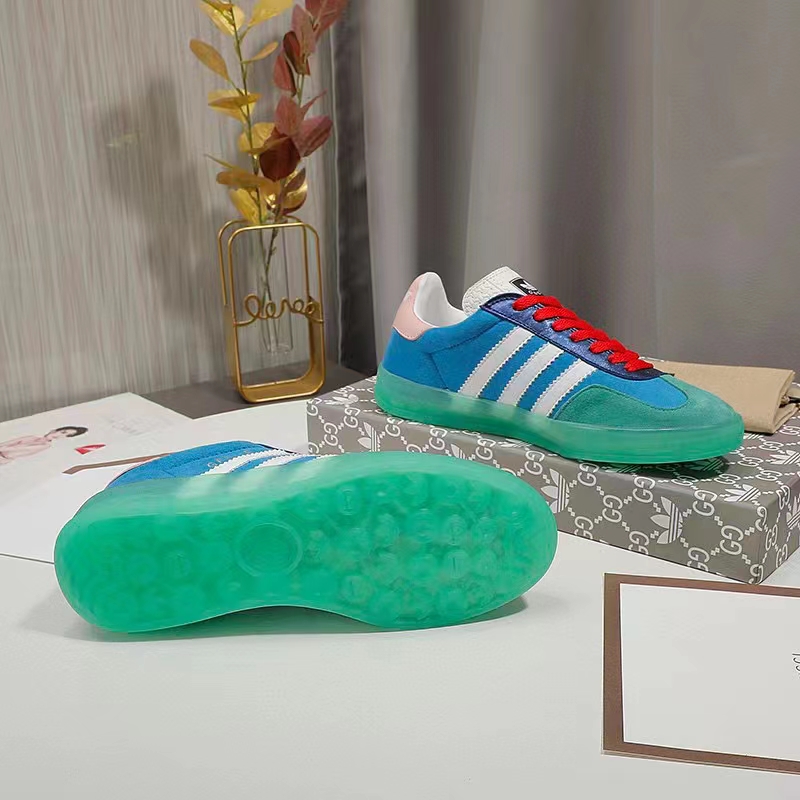 Gucci Unisex GG Adidas x Gucci Gazelle Sneaker Light Blue Silk Duchesse Demetra