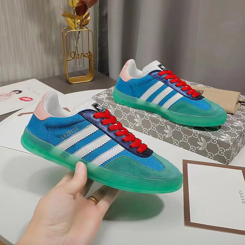 Gucci Unisex GG Adidas x Gucci Gazelle Sneaker Light Blue Silk Duchesse Demetra