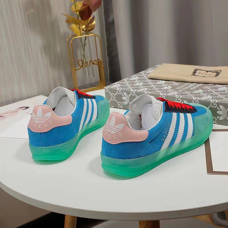Gucci Unisex GG Adidas x Gucci Gazelle Sneaker Light Blue Silk Duchesse Demetra