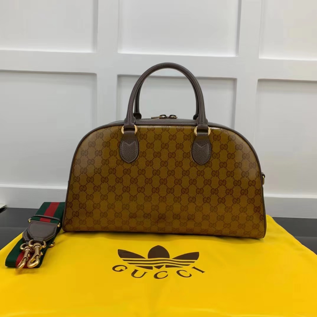 Used Brown Gucci GG Crystal Duffle Bag Houston,TX