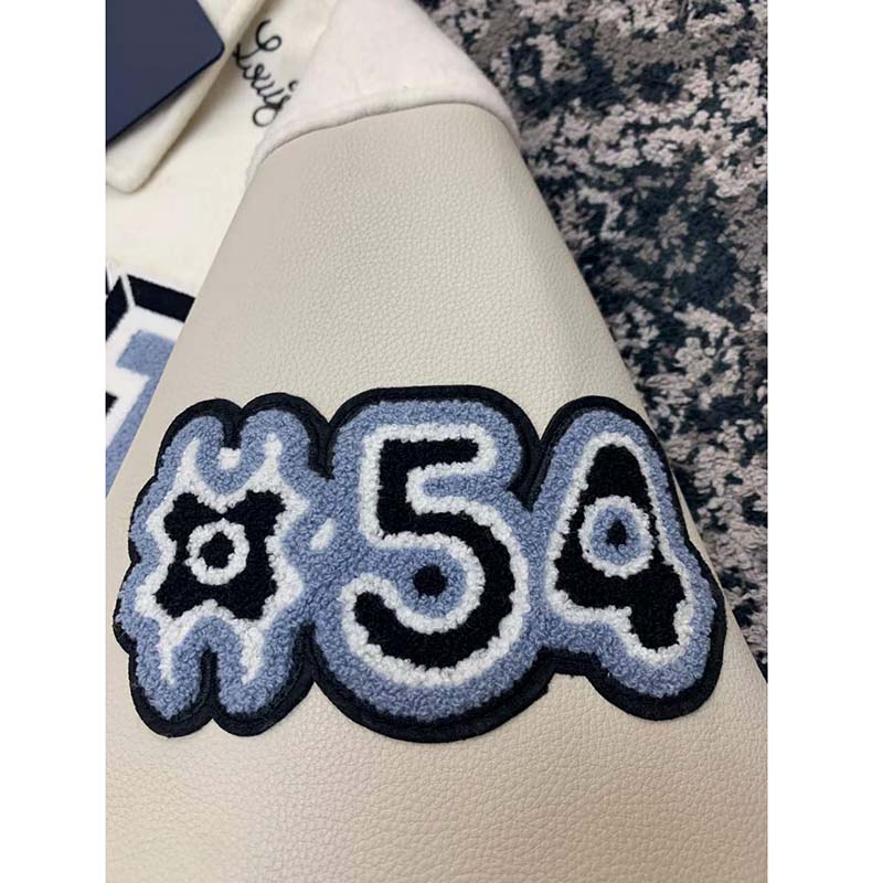 White synthetic leather with multi-color LV monogram print – logofabrics