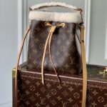 Louis Vuitton LV Women NéoNoé BB Bucket Bag Monogram Coated Canvas Shearling - Image 2